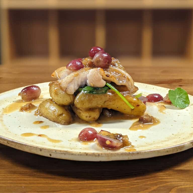 spiced grapes and lingcod dish